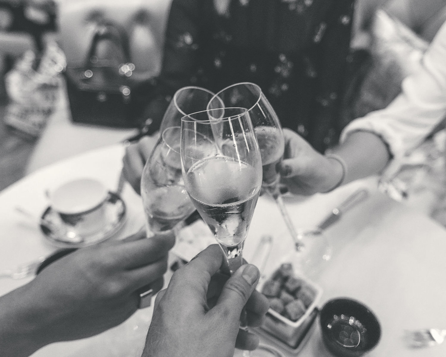 A glass raised to the moment.
